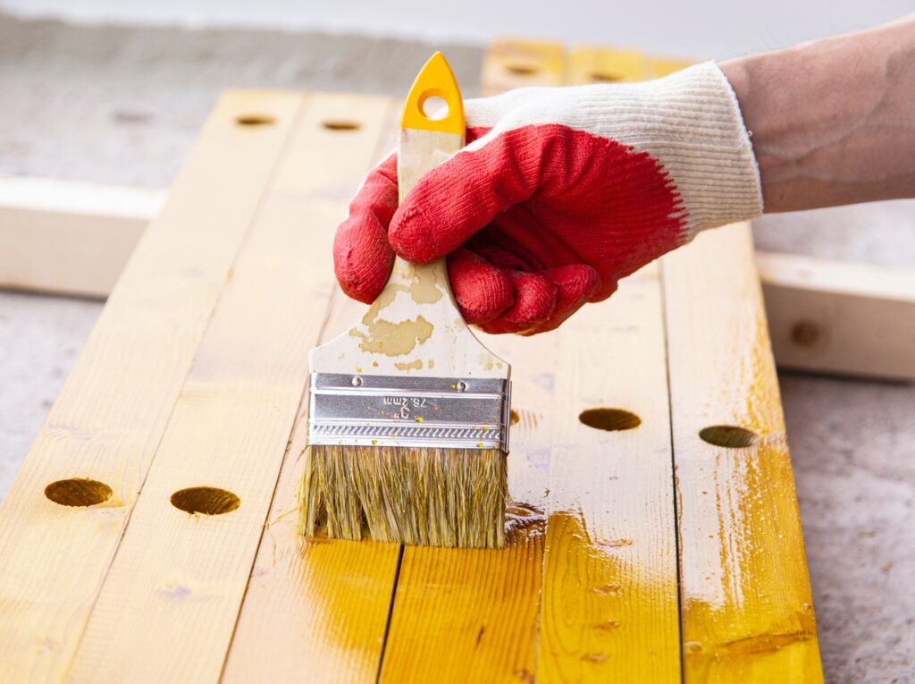 Wood being painted - Wood has a different exterior painting cost compared to other materials