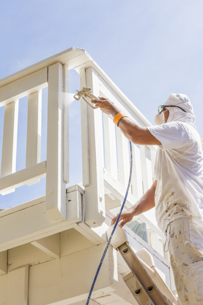 A painter from one of the residential painting contractors near me using VOC-free paints. 