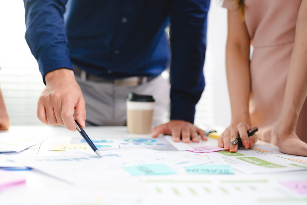 An individual negotiating with a contractor for the best price for painting services.