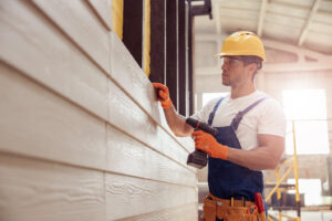 An employee from one of the siding contractors near me.