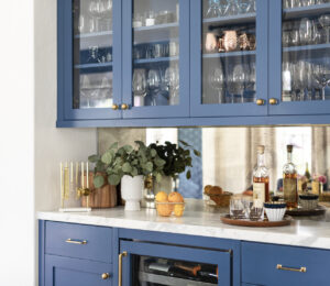 A kitchen that has received a fresh new look thanks to some cabinet paint.