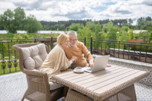 A couple outside researching what is hardie board.