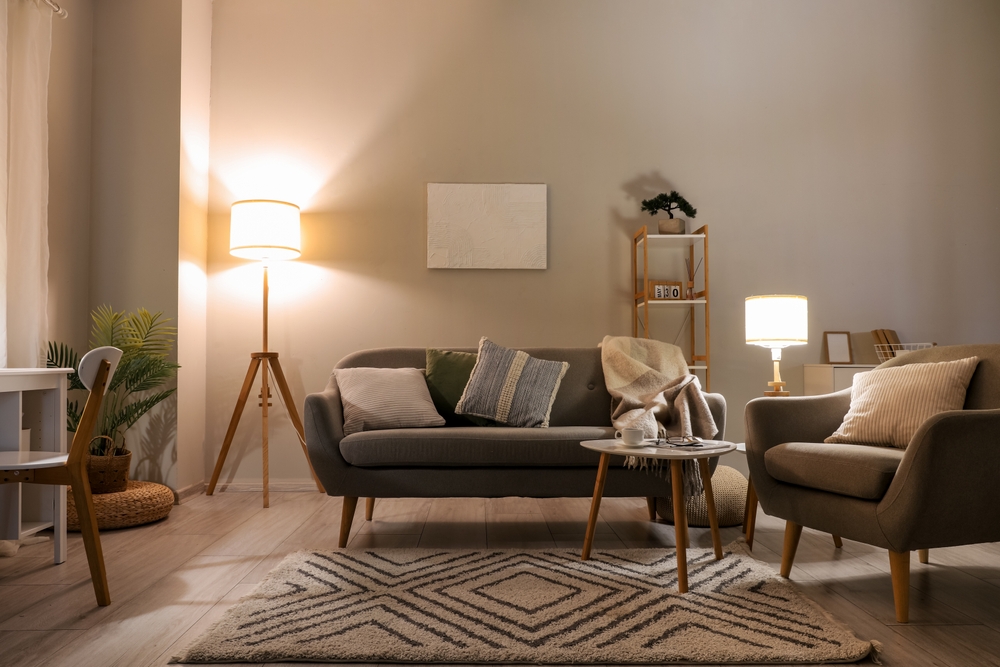 Cozy living room showcasing what are neutral colors—soft beige, warm gray, and cream tones that create a calm, balanced, and timeless atmosphere enhanced by gentle lighting and minimalist décor.
